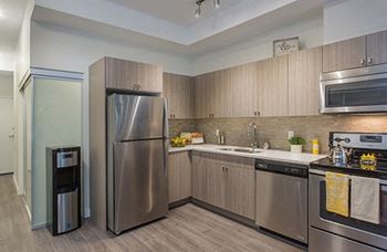 Six appliances: washer and dryer, dishwasher, fridge, stove and over the hood range microwave